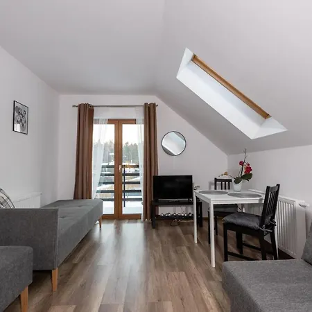 Quarto em Acomodações Particulares Pogodnewczasy W Jantarze